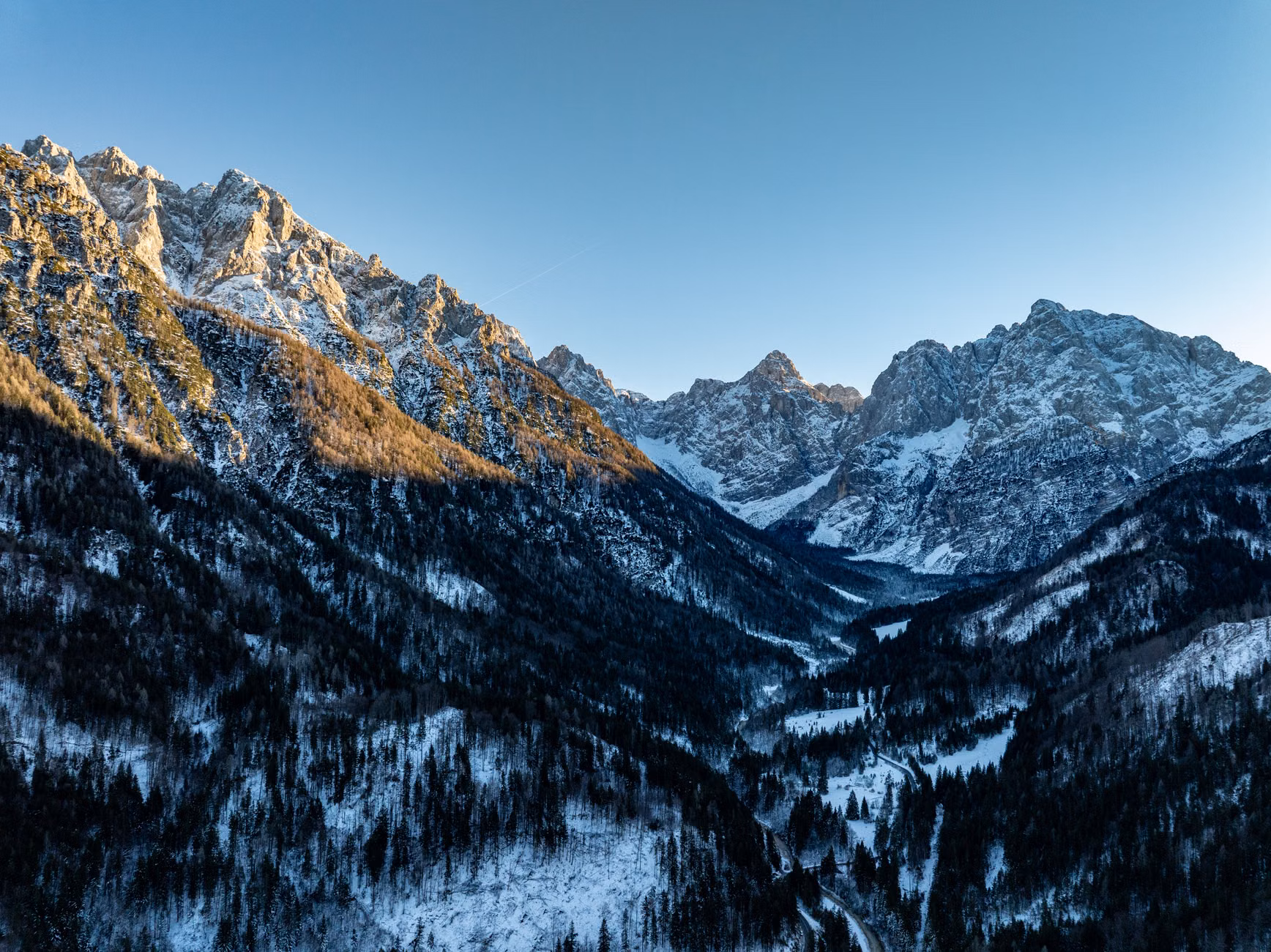 Breathtaking winter view of snow-covered mountains in Kranjska Gora, Slovenia.